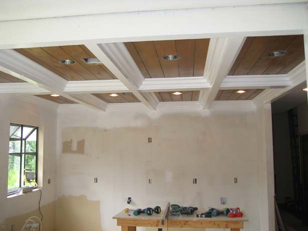 wainscotting and coffered ceilings