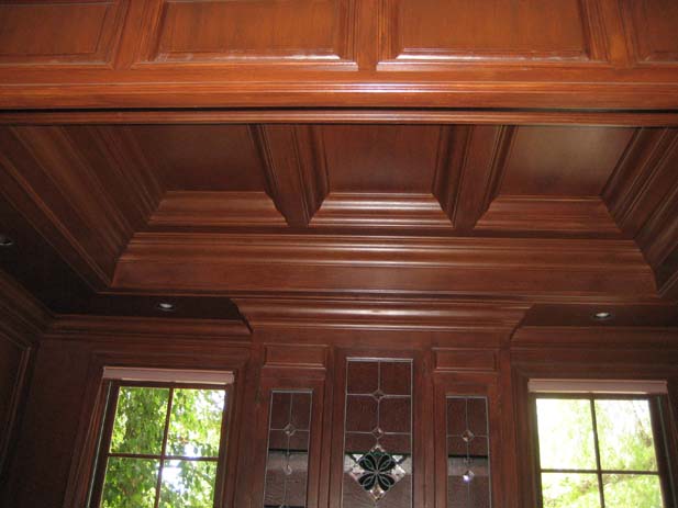 wainscotting and coffered ceilings